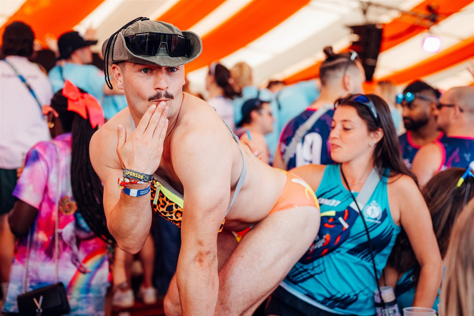 Rugby players in Budgy Smugglers looking guilty in the Beer Tent at Bournemouth 7s Festival