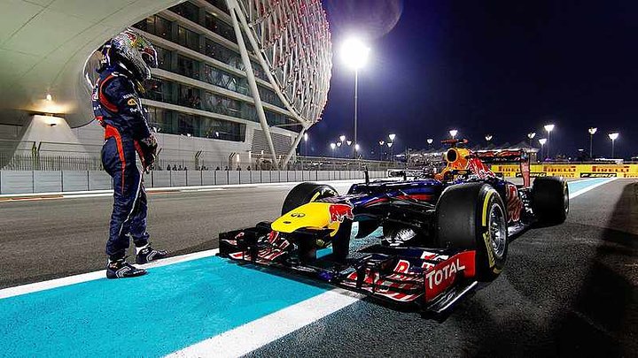 ABUDHABIUNITEDARABEMIRATESNOVEMBER03SebastianVettelofGermanyandRedBullRacingstandsnexttohiscaronthetrackafterqualifyin