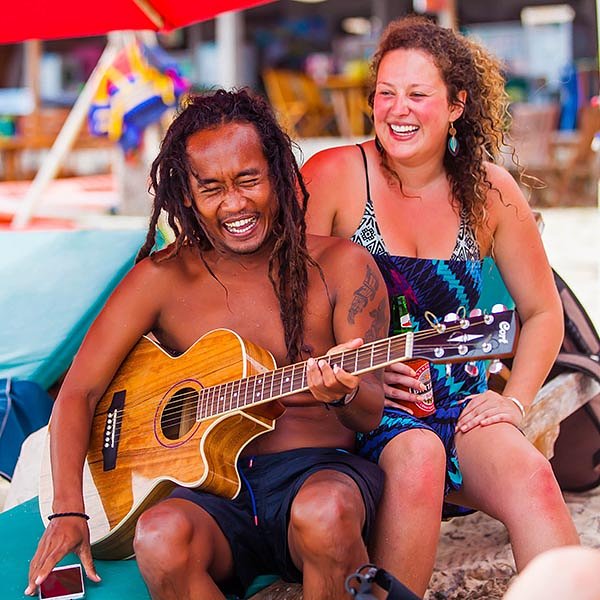 Two lbw travellers laughing in Kuta Bali indonesia