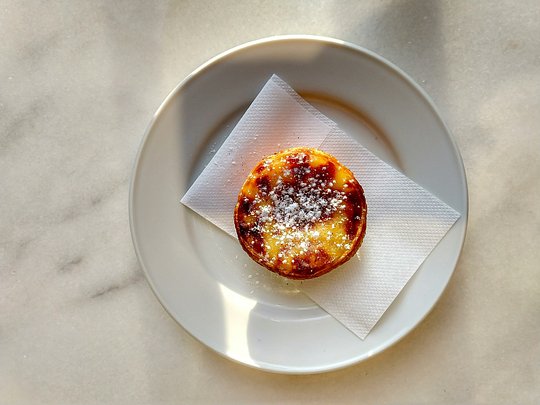 Taste local treats like Pastéis de Belém and Travesseiros