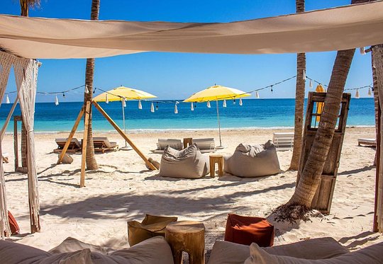 Relax and unwind with full access to the beach cabanas