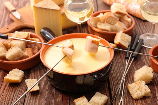 Participate in an Interactive fondue class at a private home 