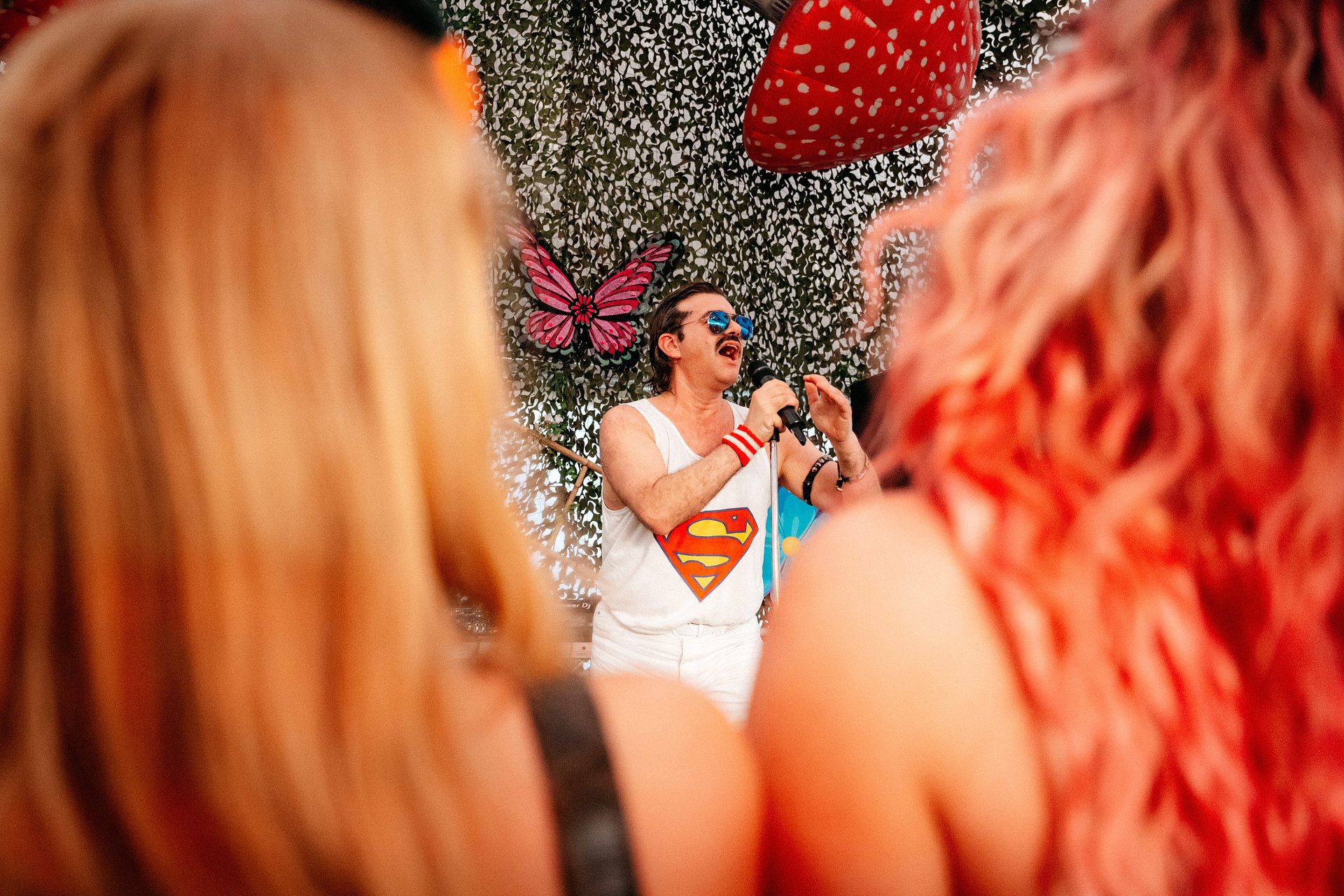 Freddie Mercury Queen in the VIP arena on stage Tribute Acts at Bournemouth 7s Festival in Dorset