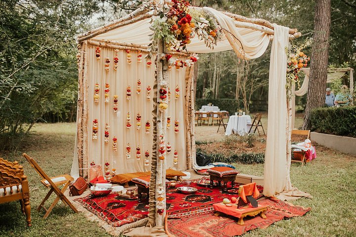 backyardprivateestatehinduweddingceremonymandapredorangemarigoldbluehouston