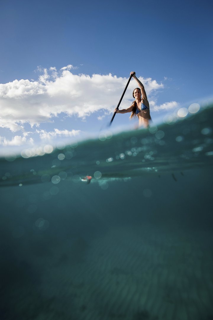 womanpaddleboardingonocean20250404113551utc