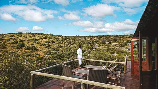 Stay in a lavish game lodge in the heart of the wildlife-rich reserve