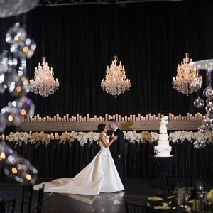 Wedding_recepetion_bride_groom_black_white_gold_chandeliersscaled300x300