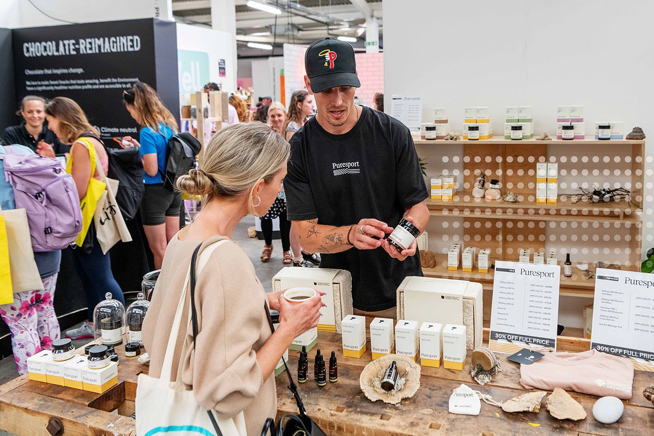 People interested in buying products at balance festival in london