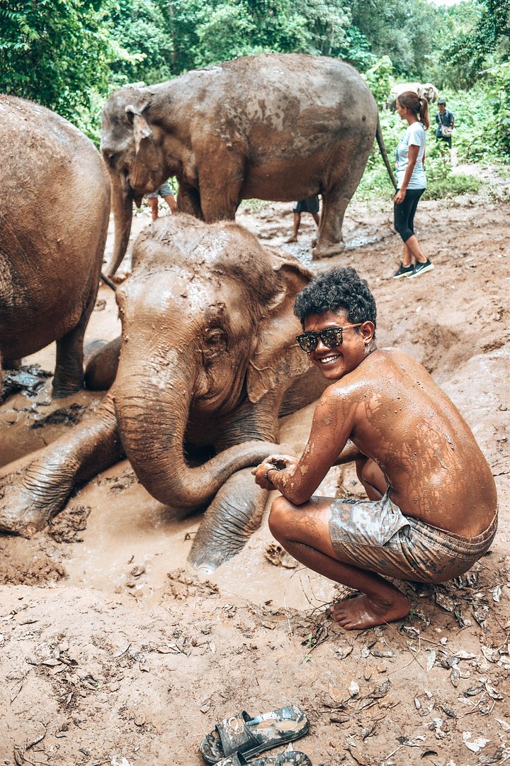 Thai elephant_LBW tour guide helping bathe an elephant at a sanctuary