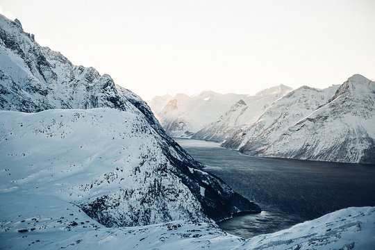 Black lava, white snow, blue ocean